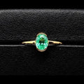 Colombian Muzo Emerald Solitaire Ring — 0.50ct Oval, 18K Yellow Gold