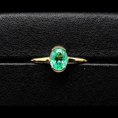 Colombian Muzo Emerald Solitaire Ring — 0.50ct Oval, 18K Yellow Gold